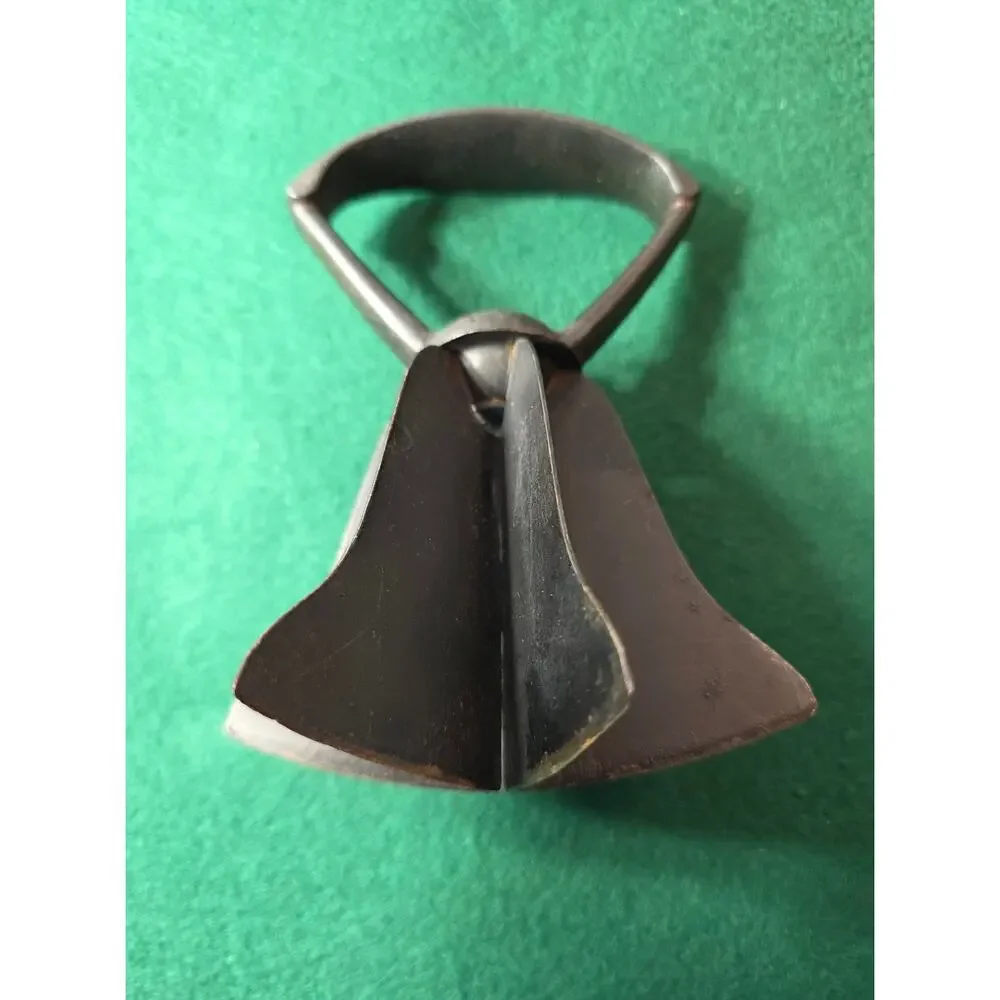 Vintage handheld metal food chopper bell-shaped cast iron handle